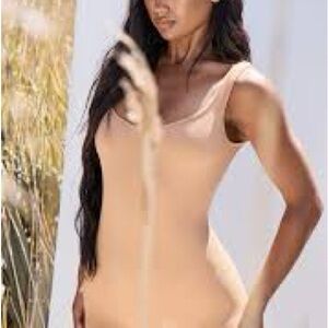 Sculpted Rib Plunge Neck Bodysuit
CAMEL